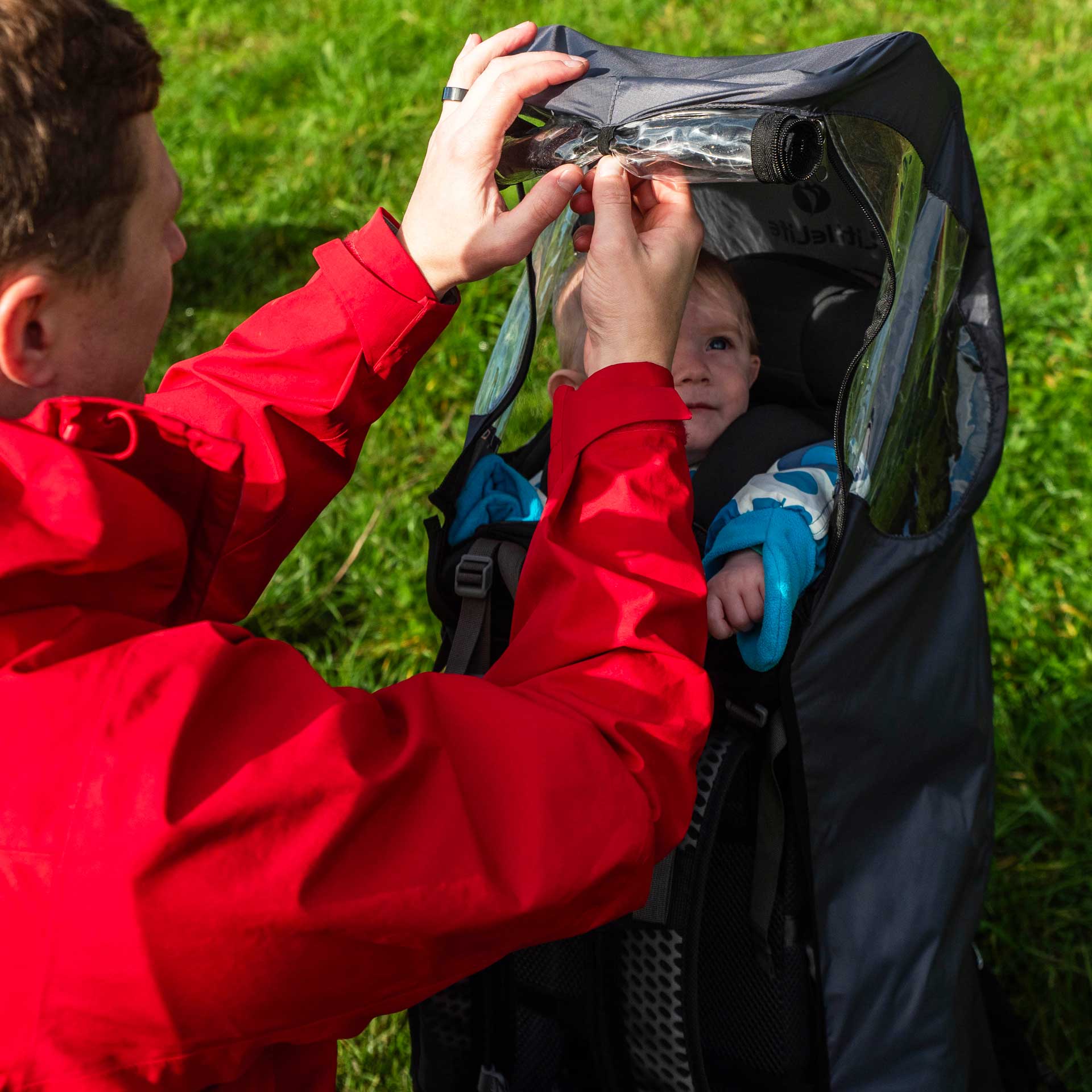 Kick-Out Leg Child Carrier Rain Cover