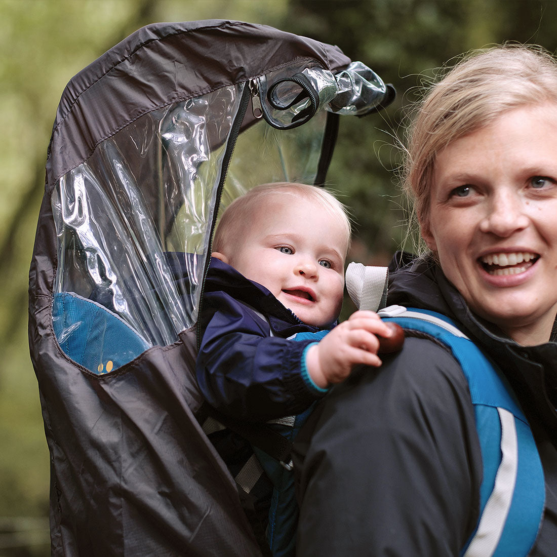 child in the rain with backpack Rain Cover | Child Carrier Accessories